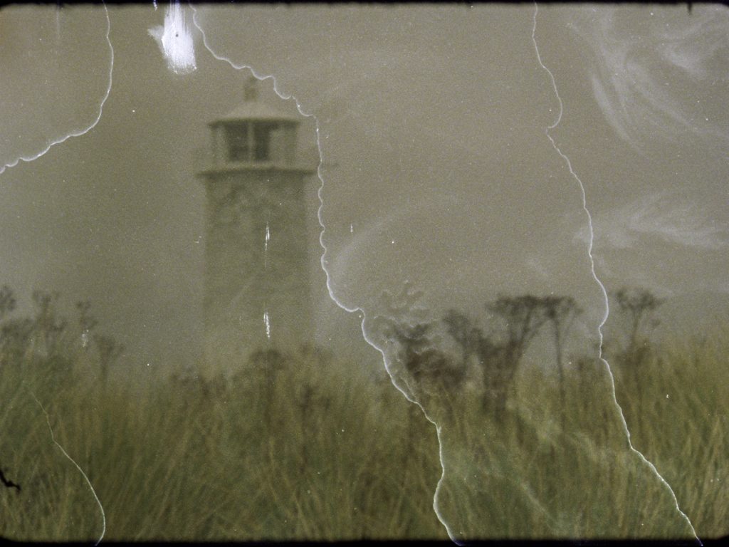 Sepia image of Walney lighthouse shot on 16mm film